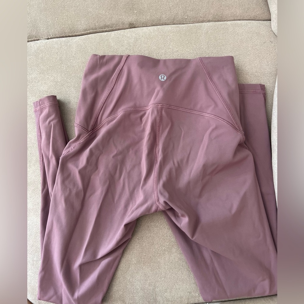 Adorable pink pearl colored Lululemon leggings! Size 4